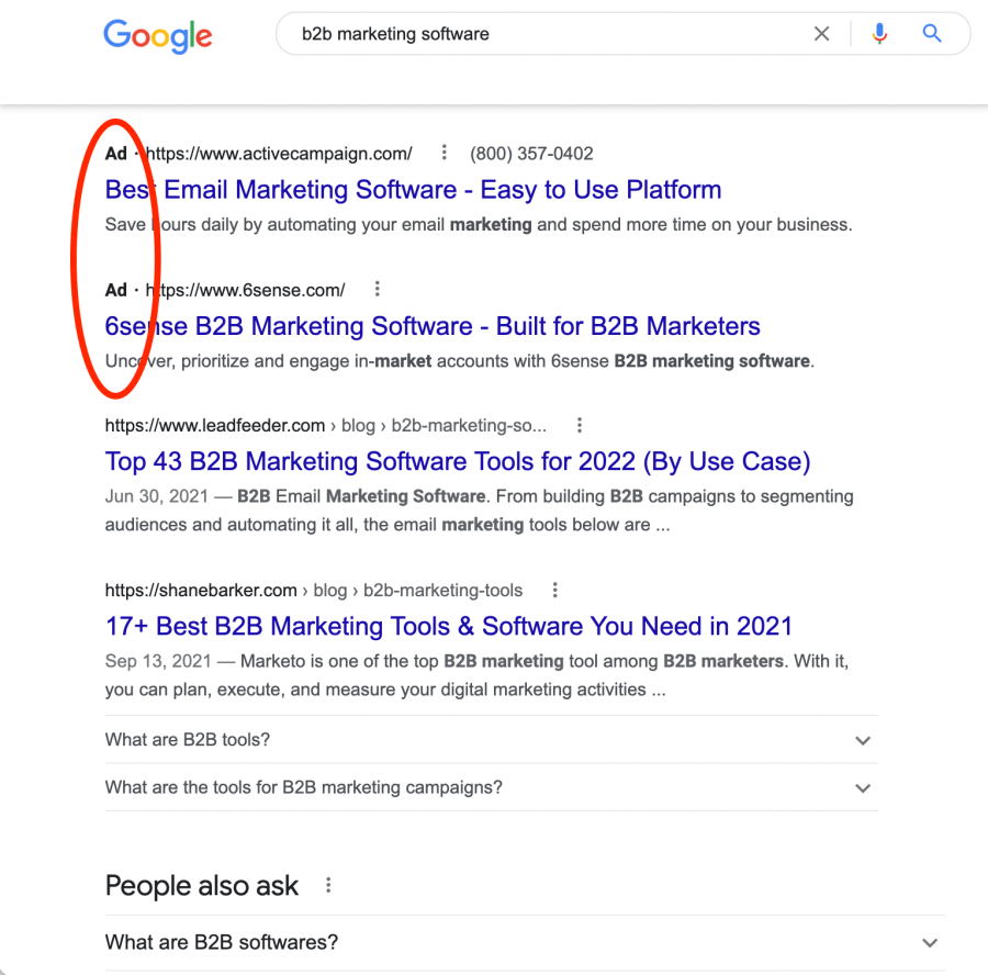 Screenshot of Google search page with the ads circled in red